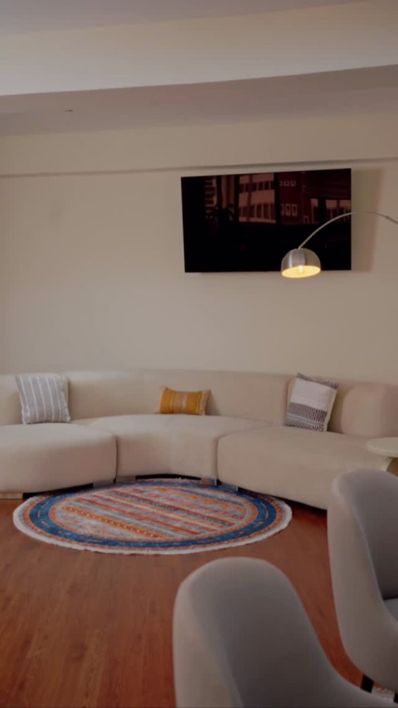 Cream curved sectional sofa